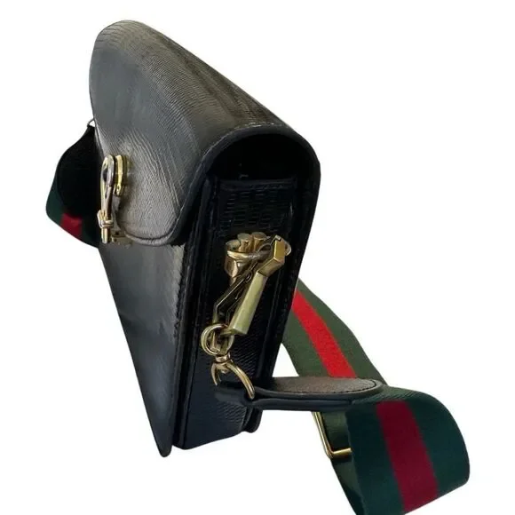 Gucci Black and Gold Leather Clutch